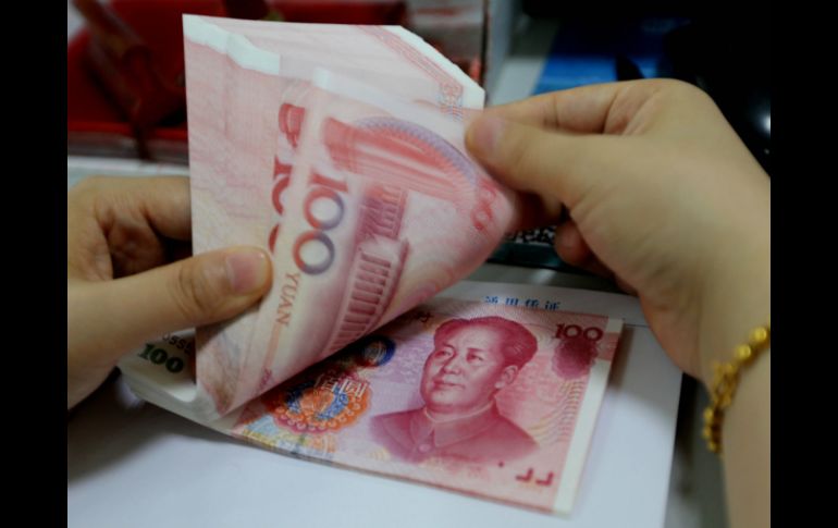 Esta devaluación de la moneda china precipitó también a principales bolsas europeas. AFP /