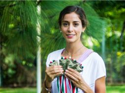 Paola Morán muestra sus cuatro medallas de oro conseguidas en la Olimpiada Nacional celebrada en Nuevo León este año. EL INFORMADOR / P. Franco