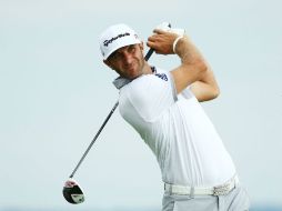 Dustin Johnson hizo un 'eagle' y cinco 'birdies'. AFP / R. Heathcote