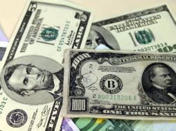 El tipo de cambio para solventar obligaciones es de 16.3658 pesos por dólar. EL INFORMADOR / ARCHIVO