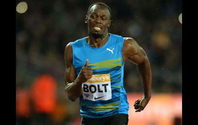 Bolt tiene los mejores recuerdos de Beijing, luego de besar la gloria en los olímpicos. AFP / ARCHIVO