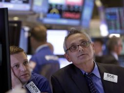 La bolsa de Nueva York borró las ganancias acumuladas durante el día tras las medidas anunciadas por China. AP / R. Drew