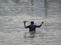 Varias calles siguen inundades en gran parte de Rajin. AP / ARCHIVO