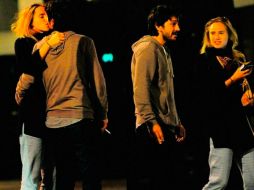 Hace unos días el Daily Mail publicó fotografías de la pareja besándose mientras esperaban un taxi en calles de Londres. ESPECIAL / dailymail