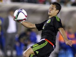 Javier Hernández, nuevo jugador del Bayer Leverkusen, no tendrá ningún inconveniente para disputar la fase de grupos de la Champions. AP / ARCHIVO