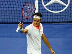 El Federer 'Expres' pasó por encima de Darcis en una hora y 20 minutos. AFP / C. Brunskill