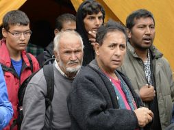 Los rescatados fueron entregados a las autoridades encargadas de la investigación. AFP / C. Stache