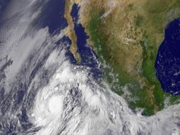 La Conagua y el SMN exhortan a la población a mantenerse informados sobre las condiciones meteorológicas. AFP /