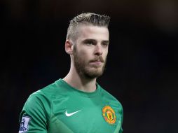 El arquero español determina seguir con los Red Devils en el futbol inglés. AFP / O.Scarff