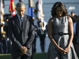 Fue en el jardín de la Casa Blanca, donde Barack Obama y su esposa Michelle recordaron a las víctimas del atentado en el WTC. AFP / S. Loeb
