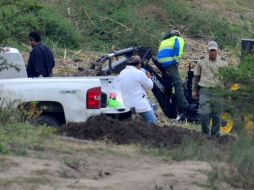 Investigadores y elementos de la Policía Ministerial Acreditable realizan el peritaje necesario. EL INFORMADOR / ARCHIVO