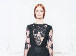 Elegante. El vestido que usó la primera dama en la visita a España en junio pasado. YOUTUBE /