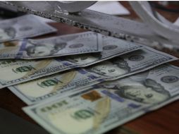 Estiman que este jueves el tipo de cambio oscile entre 16.50 y 16.80 pesos por dólar. EL INFORMADOR / ARCHIVO