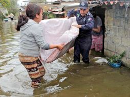 Decenas de viviendas de la delegación de San Lucas Tunco, de Metepec se vieron afectadas por el desbordamiento del río Lerma. SUN / J. Alvarado