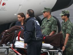 Este viernes, los seis sobrevivientes del ataque de las fuerzas de El Cairo llegaron a México en el avión presidencial. EFE / M. Guzmán