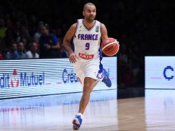 Parker logró 13 puntos para su equipo, que tendrá que ir a repechaje rumbo a Río. AFP / E. Dunand