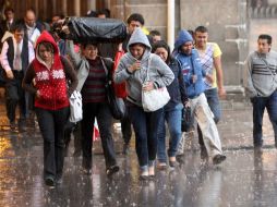 La Conagua advierte que las zonas de tormenta podrían tener relámpagos, fuertes rachas de viento y posible caída de granizo. NTX / ARCHIVO