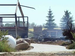 Un transeúnte avisó del incendio en la casa, pero el jefe de bomberos dijo que cuando llegaron el inmueble estaba destruido totalmente. AP /