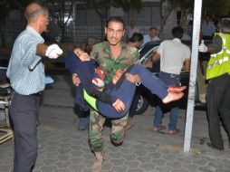 En Internet circularon fotografías donde se mostraban a varios hombres gritando por ayuda. AFP / ARCHIVO