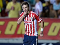 Isaac Brizuela celebra una de las dos anotaciones que consiguó en el encuentro de ayer ante Morelia. MEXSPORT / I. Ortiz