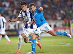 Gerónimo Amione intenta sacar su disparo a la portería de los Tuzos. MEXSPORT / J. Ramírez