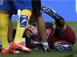 Messi pidió al entrenador que aguantara el cambio. Pero, al primer balón que tocó, el rosarino se dio cuenta de que no podía seguir. AFP / L. Gene