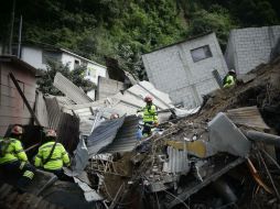 Las labores de rescate continúan en la colonia El Cambray II. AFP / J. Ordoñez