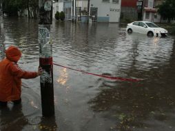 En un reporte preliminar en este puerto se registraron 800 viviendas y 400 vehículos dañados y 16 colonias. NTX / ARCHIVO