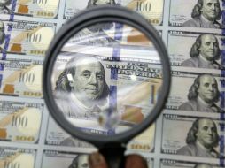 El tipo de cambio es de 16.4180 pesos, solventar obligaciones denominadas en moneda extranjera pagaderas en México. EFE / ARCHIVO