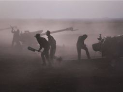 Los rebeldes logran recuperar el control de una ciudad en manos del EI; Rusia continuará con sus operaciones en Siria. AP / A. Kots