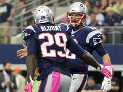El tridente de Brady, y el corredor LeGarrette Blount, hizo trizas a la defensiva texana. EFE /  L. Smith