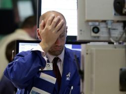 El índice industrial Dow Jones reportaba durante los primeros minutos de transacciones de este lunes una leve baja. AP / R. Drew