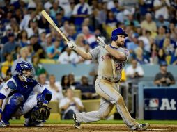 Daniel Murphy anotó la carrera del empate tras robarse la tercera y después pegó el jonrón para la ventaja definitiva. AFP / H. How