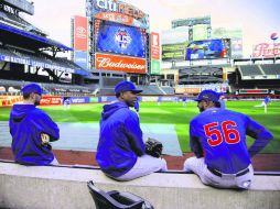 Miguel Montero y Héctor Rondón tras la práctica de ayer de los Cachorros. AP / J. Jacobson