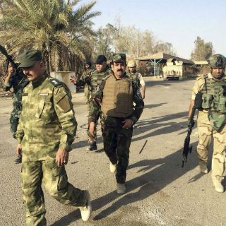 Blair y Bush acordaron invadir Iraq un año antes de la guerra