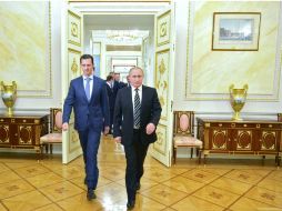 Los presidentes de Rusia y Siria se reunieron para analizar el avance de la lucha contra el terrorismo en Siria. EFE / A. Druzhinyn