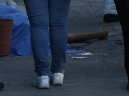 Tras corroborar el deceso, llegaron peritos de la Procuraduría para iniciar las diligencias correspondientes. EL INFORMADOR / ARCHIVO