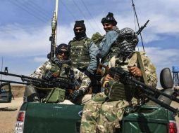 Agentes de la policía afgana patrullan el distrito de Ghorian tras un ataque perpetrado por talibanes. EFE /  J. Rezaye