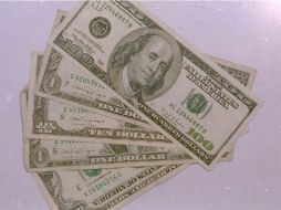 El tipo de cambio para solventar obligaciones denominadas en moneda extranjera pagadera es de 16.6219 pesos, informa Banxico. EL INFORMADOR / ARCHIVO