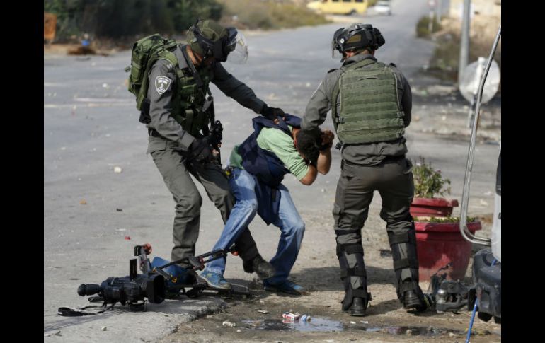 En Israel, los periodistas son víctimas de agresiones y abusos por parte de las autoridades. AFP / A. Momani