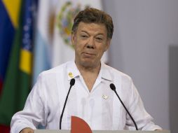 Santos anunció el 23 de septiembre que en un plazo máximo de seis meses se firmaría la paz con los rebeldes. AP / ARCHIVO