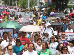 La gente caminó a lo largo de la avenida Tulum desde la tarde de este sábado. EL INFORMADOR / ARCHIVO