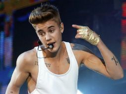 Bieber dijo que su amigo le había dado malas noticias y se molestó,pero que no es un acto violento contra sus fans. AP / ARCHIVO