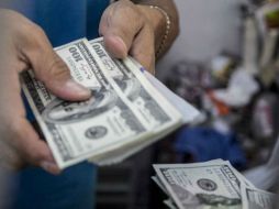 Banxico informó que el tipo de cambio para solventar obligaciones denominadas en moneda extranjera pagaderas es de 16.7113 pesos. EL INFORMADOR / ARCHIVO