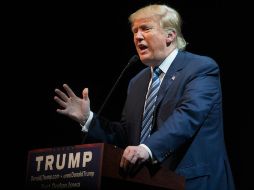 El precandidato republicano dice al público que Carson es un enigma para él. AFP / ARCHIVO