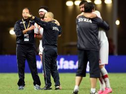 El DT dedica la victoria al pueblo sirio y a su presidente Bashar al-Asad. AFP / R. Rahman