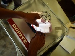 La definición de las elecciones presidenciales está pautada en la segunda vuelta, a celebrarse el 27 de diciembre. AFP / ARCHIVO