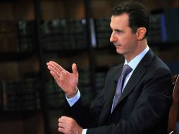El EI 'no empezó en Siria, empezó en Iraq, y antes en Afganistán', dijo Bashar al Assad. AP / ARCHIVO
