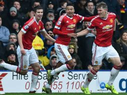 El Manchester United derrota por 2-1 al Watford, gracias a un gol en propia meta casi al finalizar el encuentro. AFP / B. Stansall