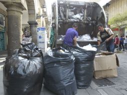 El Ayuntamiento señala que en ocasiones los comerciantes del Centro no contratan servicios de manejo de residuos. EL INFORMADOR / F. Atilano
